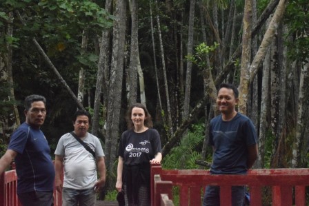 Pak Milson  (far left), Pak Adam (in white), Charlotte, and Gede at the Bak Blau lake bridge.