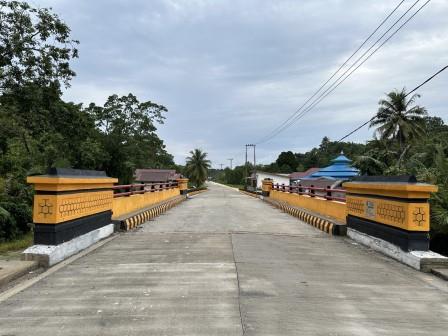  section of the main street and newly built bridge at Meok Village